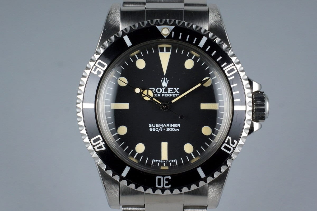 Reference image of a Rolex Submariner 5513 with aged tritium lume